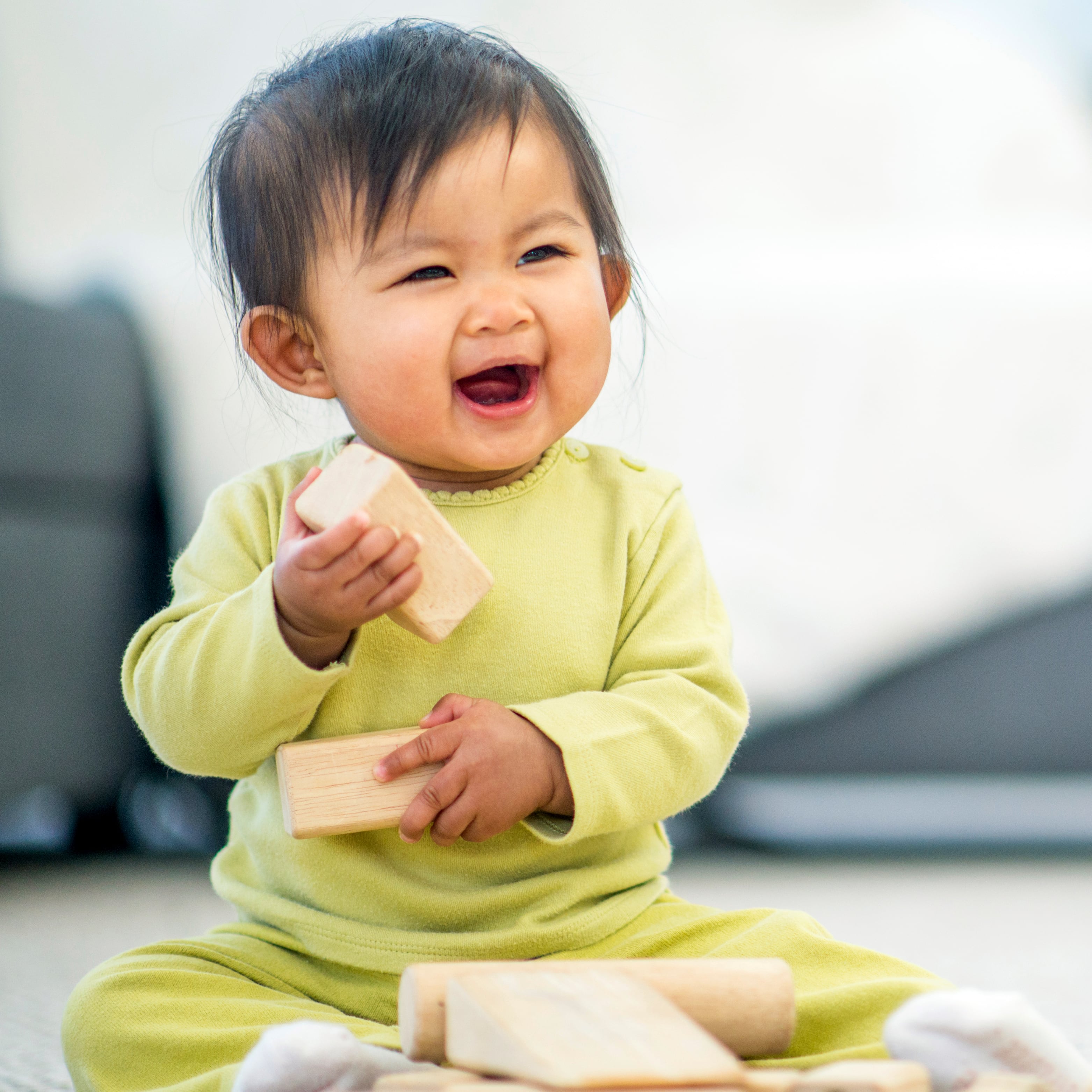 Toddler playing with toys
